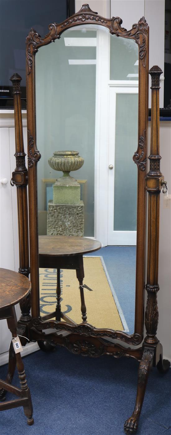 A Chippendale style carved mahogany cheval mirror, 192cm high